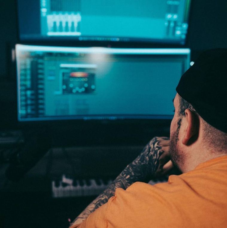 Working on a mix at the monitors