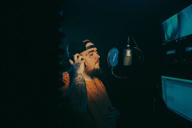 At the mic with studio monitors