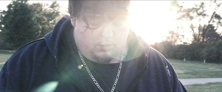 Sunlit portrait with lens flare